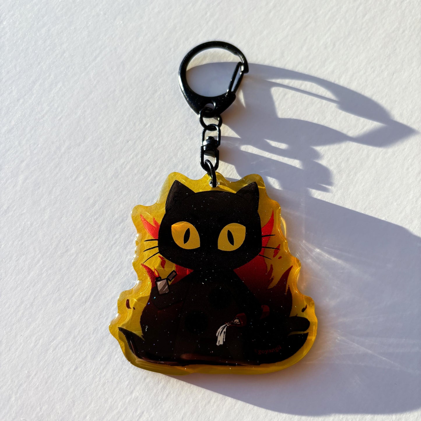 Arson Cat Glitter Acrylic Keychain